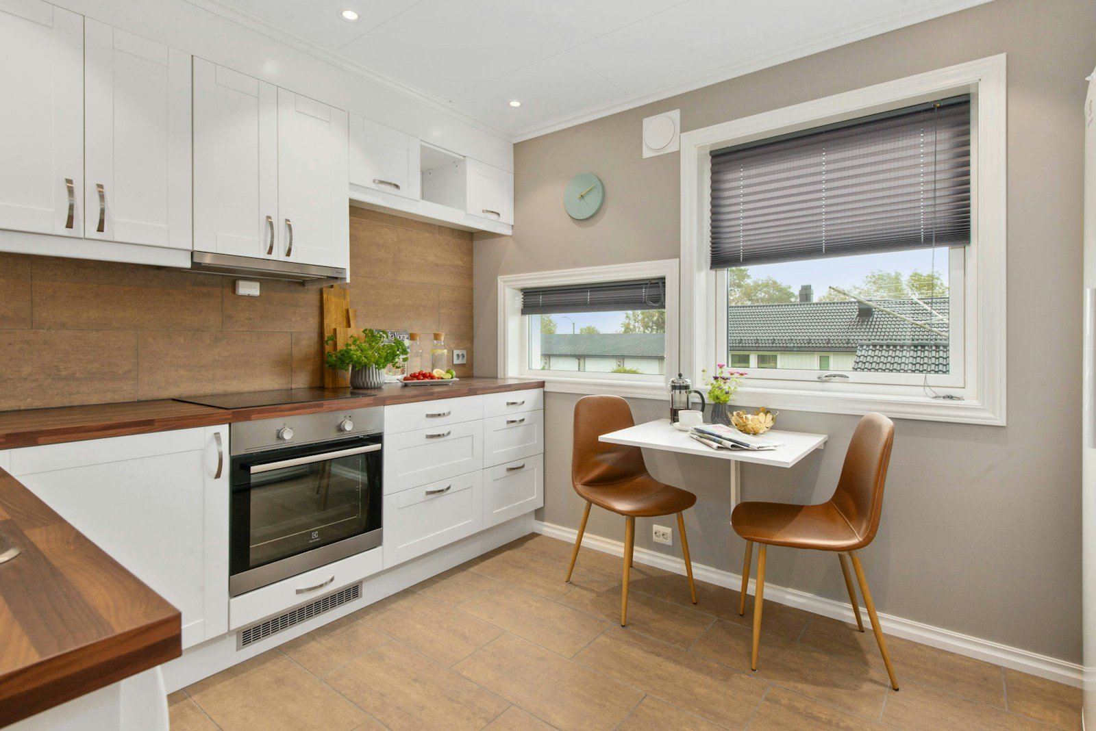 Illustrative kitchen remodel inspiration with white cabinetry